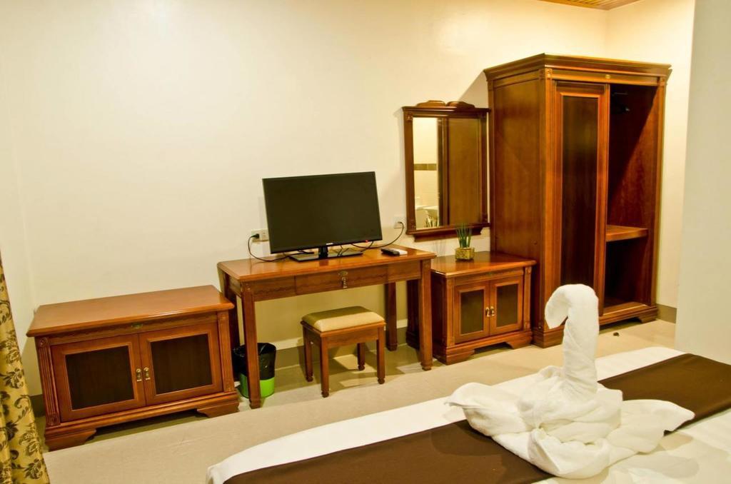 เดอะ พรีเมียร์ บิสซิเนส โฮเต็ล Hotel กาลิโบ ห้อง รูปภาพ